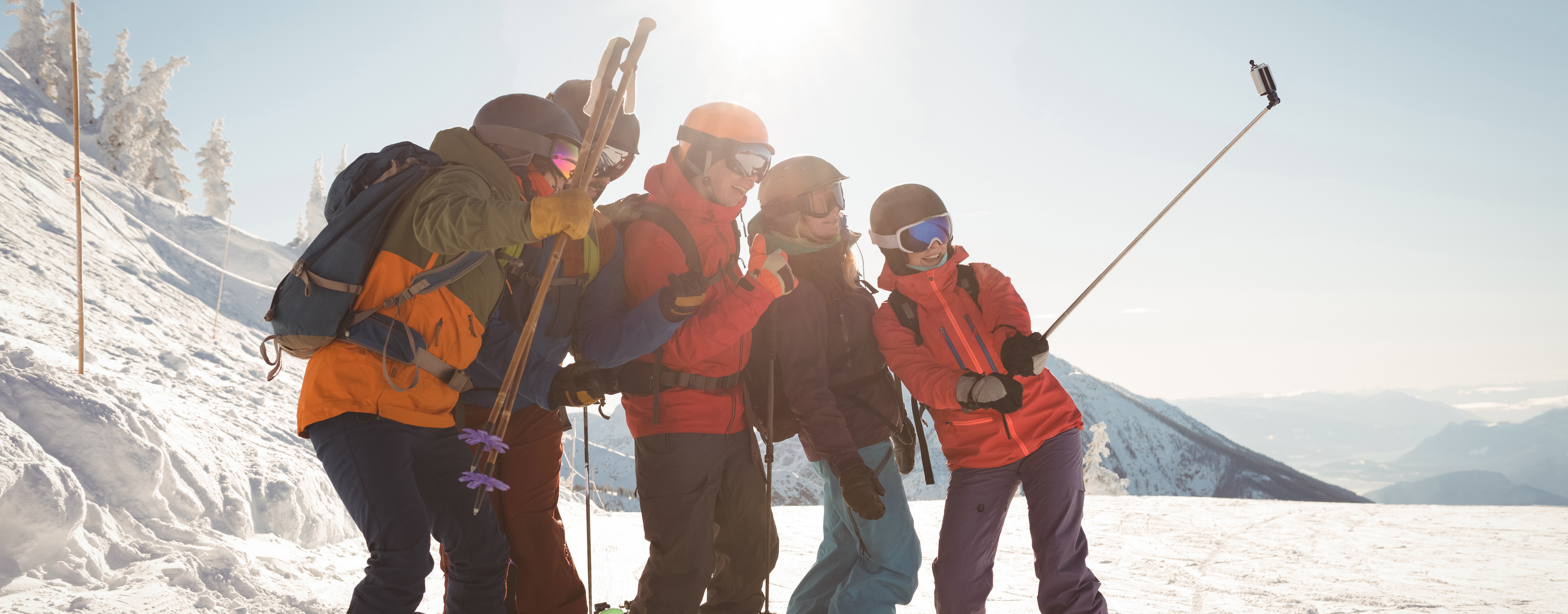 group-skiers-taking-selfie-mobile-phone.jpg