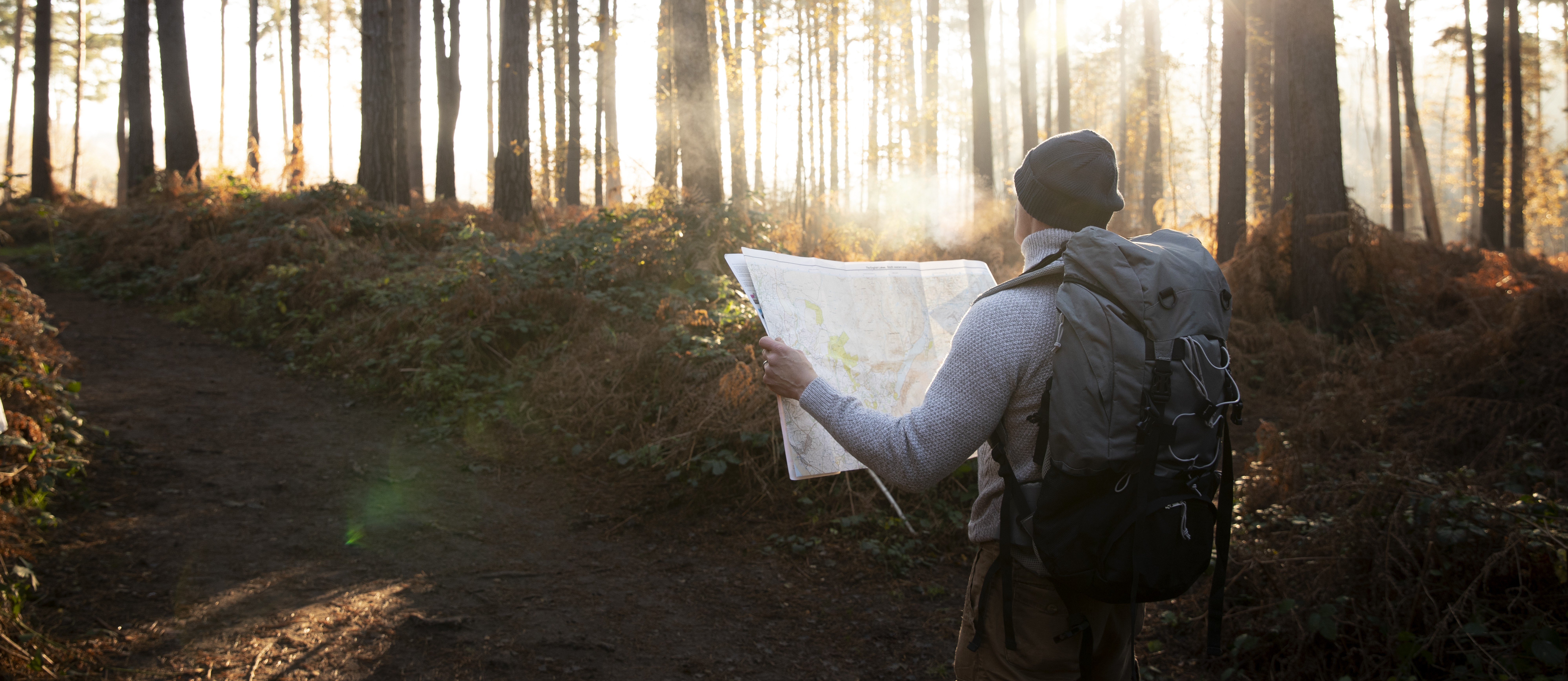 medium-shot-man-exploring-with-map.jpg